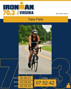 Dr Dipa Patel biking in Ironman