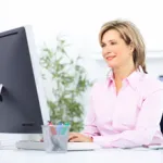 woman at desktop computer