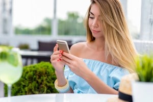 Woman visualizing procedure on her own smartphone