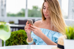 Woman visualizing procedure on her own smartphone